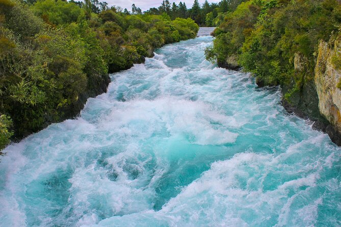 2 Day Tour Auckland to Hobbiton, Waitomo, Rotorua and Taupo - Huka Falls: a short walk to big water