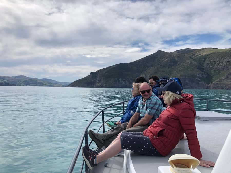 Akaroa: Scenic Coastline Wildlife Cruise - Pulling up the lobster pot