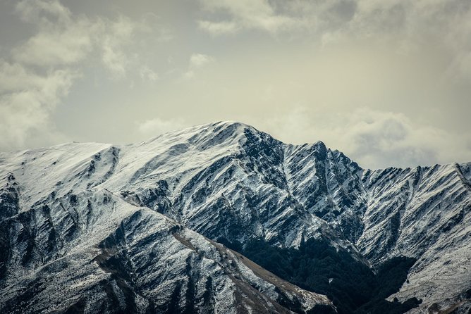 AuthenticAs Discover Queenstown - Professional Photography & Exclusive 4WD Tour - Lake Hayes: a quiet frame for mountain scenery