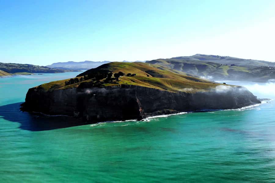 Christchurch: Guided Crater Rim Walk with Picnic - The Antarctic cabin and penguin colony bring variety