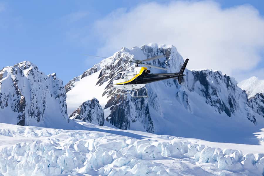 Franz Josef: Glacier Helicopter Ride with Snow Landing - Stepping onto the snow at the landing site
