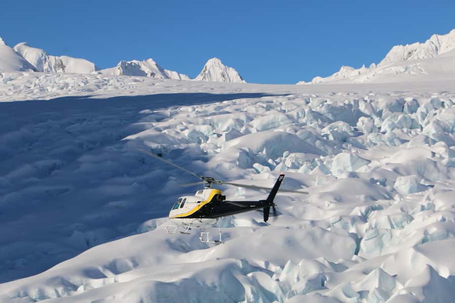 Franz Josef: Glacier Helicopter Ride with Snow Landing - Flying over Franz Josef’s ice pinnacles and crevasses