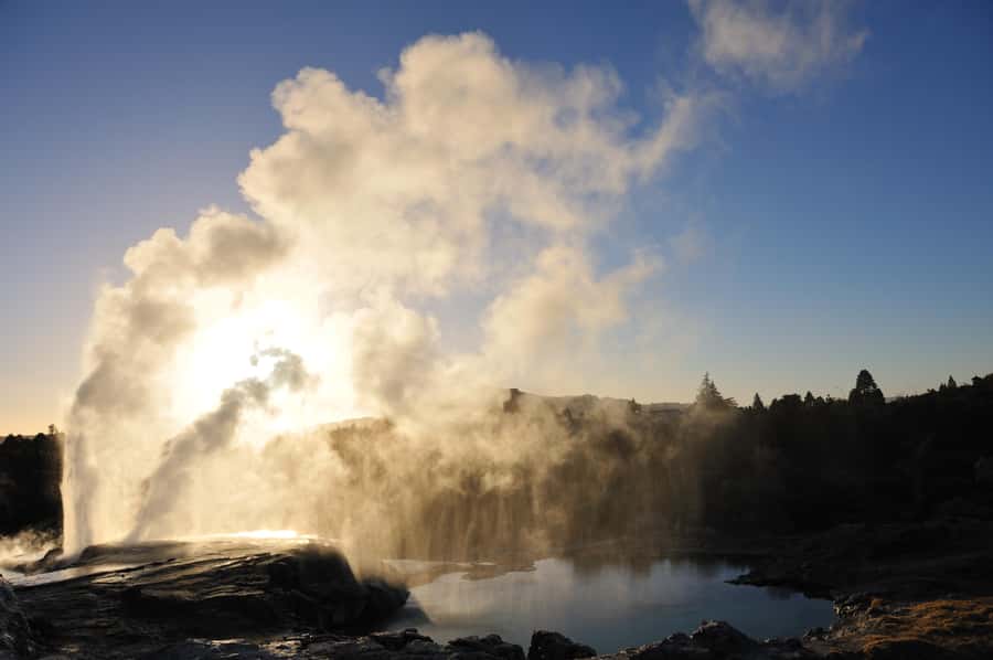 From Auckland: Rotorua Te Puia, Haka & Polynesian Spa Tour - Walking into Te Puia’s geothermal valley