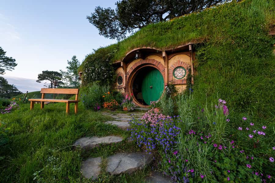 From Matamata: Guided Hobbiton Experience with Bus Transfers - Walking into the 12-acre Shire