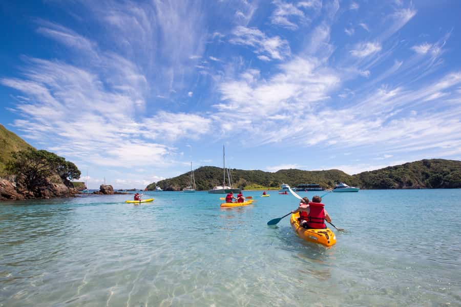 From Paihia: The Rock Adventure Overnight Cruise - Beach games, WWII remains, and the trip home