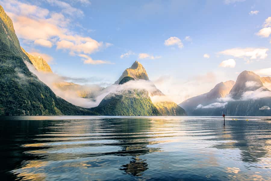From Queenstown: Milford Sound Premium Day Tour and Cruise - Leaving Queenstown in a purpose-built coach