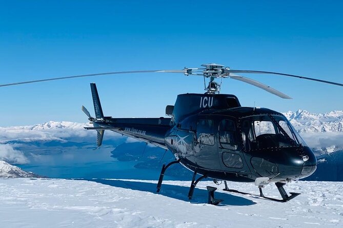 Helicopter Tour with Alpine Snow Landing from Queenstown - Photos Above the Town