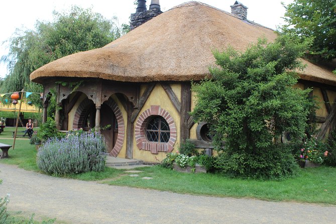 Hobbiton and Waitomo Caves from Auckland - Smaller Group - Walking through Hobbiton Movie Set