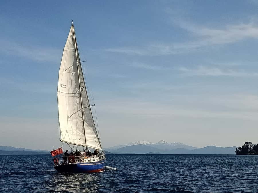 Lake Taupo: Sailboat Trip to the Maori Rock Carvings - Listening to local stories on the way to Mine Bay