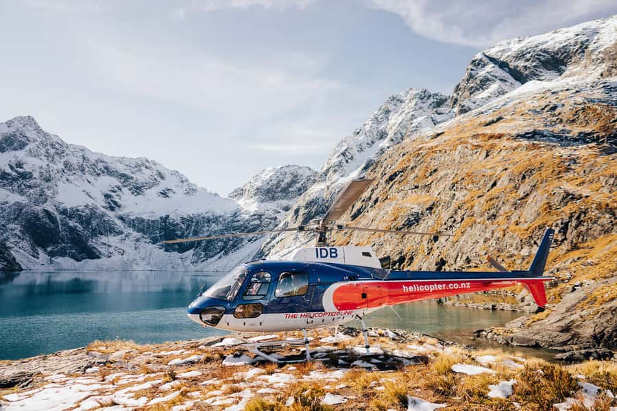 Milford Sound: 1.5-Hour Helicopter Tour with Two Landings - Crossing The Divide into Fiordland