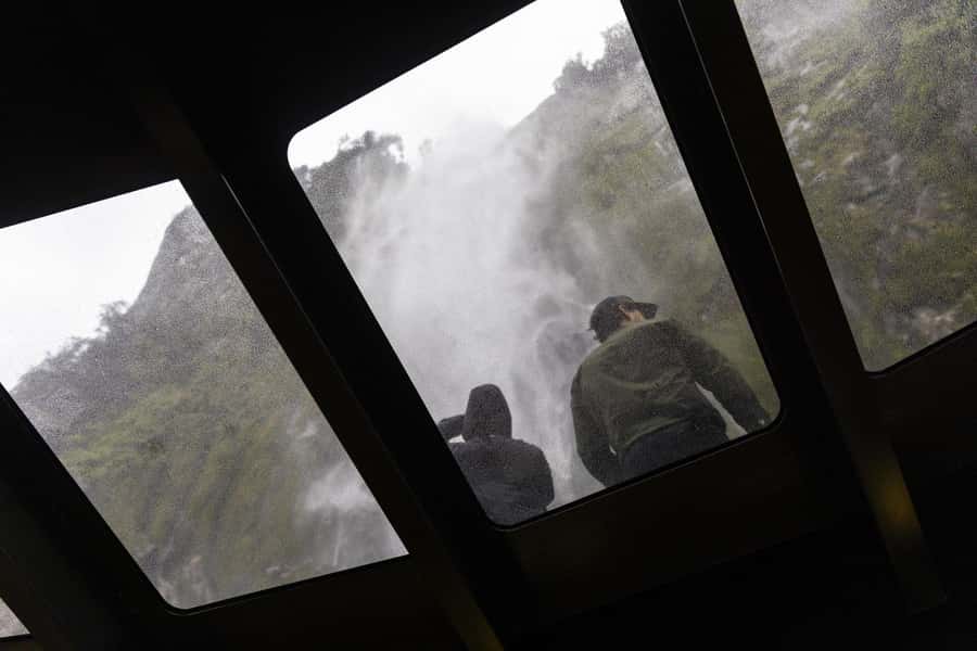 Milford Sound: Premium Small Group Cruise with Canape Lunch - What to bring for a wet, exposed fiord