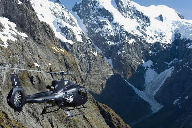 Premium Milford Sound Tour Including Cruise, Flight & Lunch - Mirror Lakes rewards a short walk