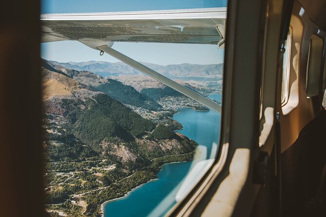 Premium Milford Sound Tour Including Cruise, Flight & Lunch - Leaving Queenstown beside Lake Wakatipu