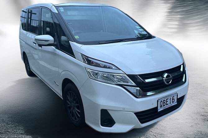 Private Auckland Airport Transfer: to/from City Hotels in Minivan - Inside the minivan: useful extras, not luxury theater