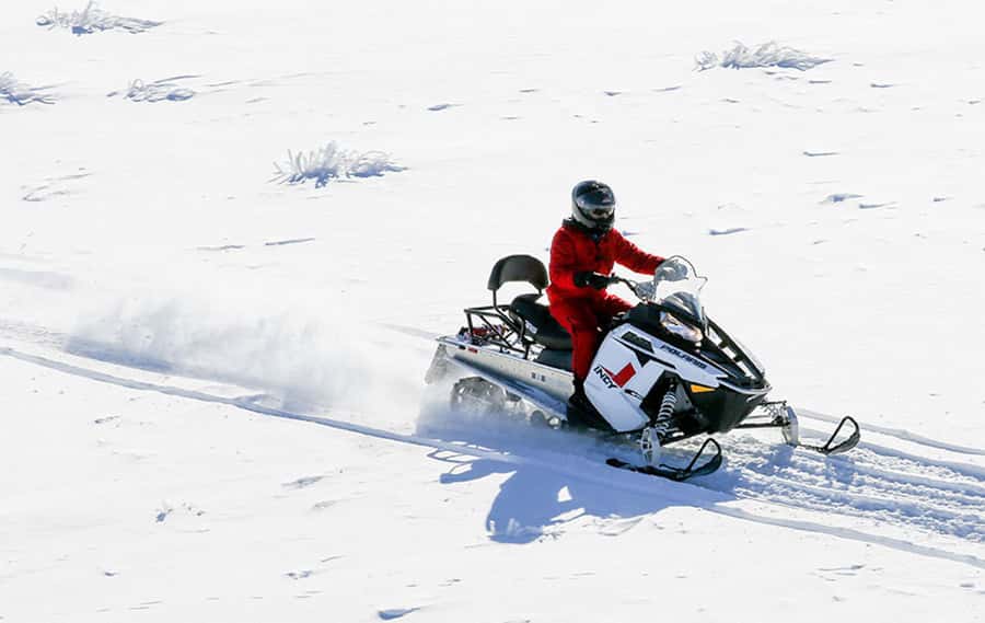 Queenstown: Snowmobiling Experience with Helicopter Flight - Flying from Queenstown to the Garvie Range