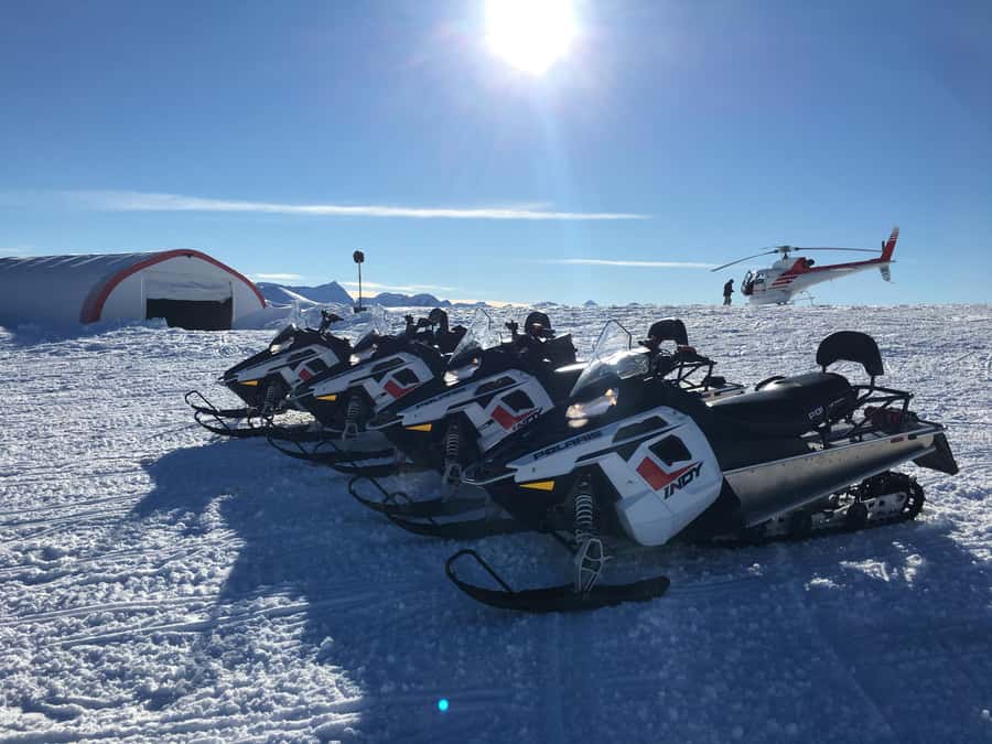 Queenstown: Snowmobiling Experience with Helicopter Flight - Getting fitted for a snowmobile ride