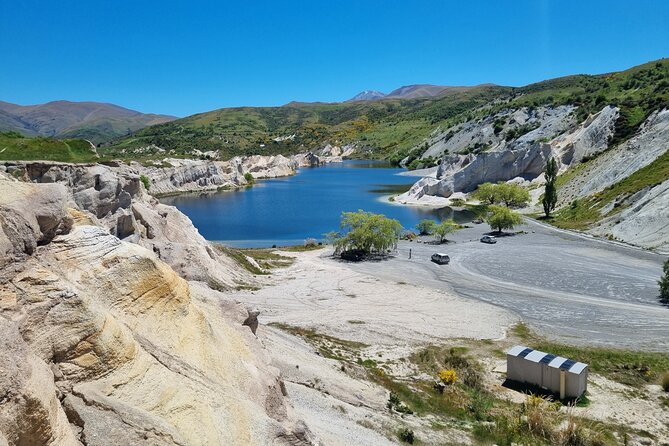 Queenstown to Dunedin with Taieri Gorge Train One-Way Tour - St Bathans and its mining-made Blue Lake