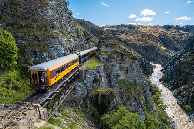 Queenstown to Dunedin with Taieri Gorge Train One-Way Tour - Arriving at Dunedin Railway Station