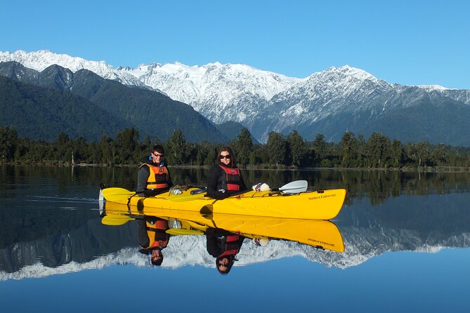 Small-Group Kayak Adventure from Franz Josef Glacier - Paddling the dark waters of Lake Mapourika