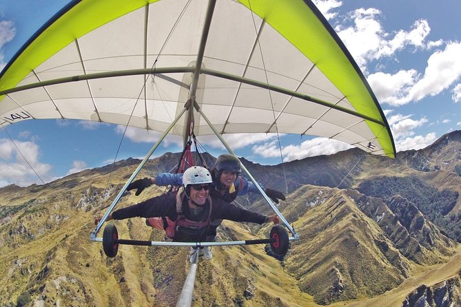 Tandem Hang Gliding - Landing in the valley and returning to town