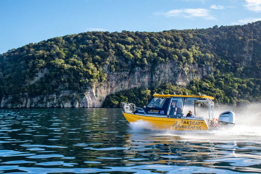 Taupo: Lake Taupo Western Bays Catamaran Tour with Bush Walk - Otupotu Falls, viewed from the water