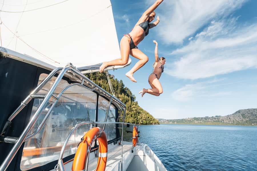Taupo: Māori Rock Carvings Lake Taupo Catamaran Tour - The freshwater swim on the return journey