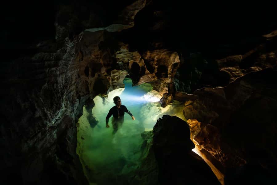 The Waitomo Experience : Okohua Glowworm Cave Tour - Walking, wading, and climbing underground
