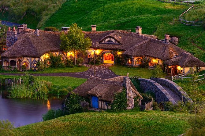 Waitomo Caves & Hobbiton Small Group Tour inc Lunch from Auckland - Hobbiton’s green bus and 12-acre movie set