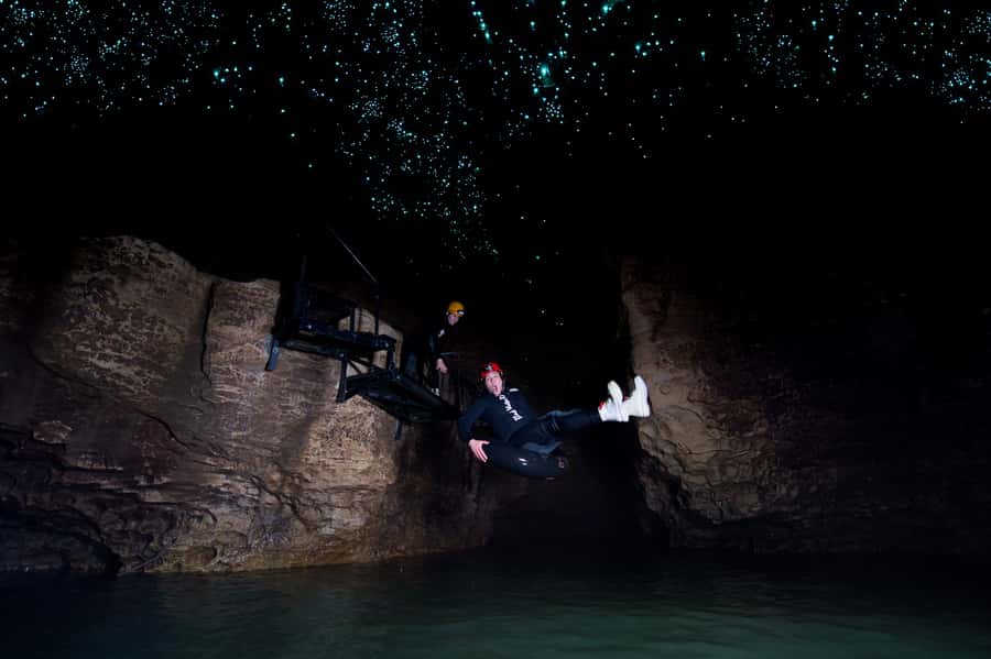 Waitomo Caves: Labyrinth Black Water Rafting Experience - Waterfalls, rock slides, and the first real thrills