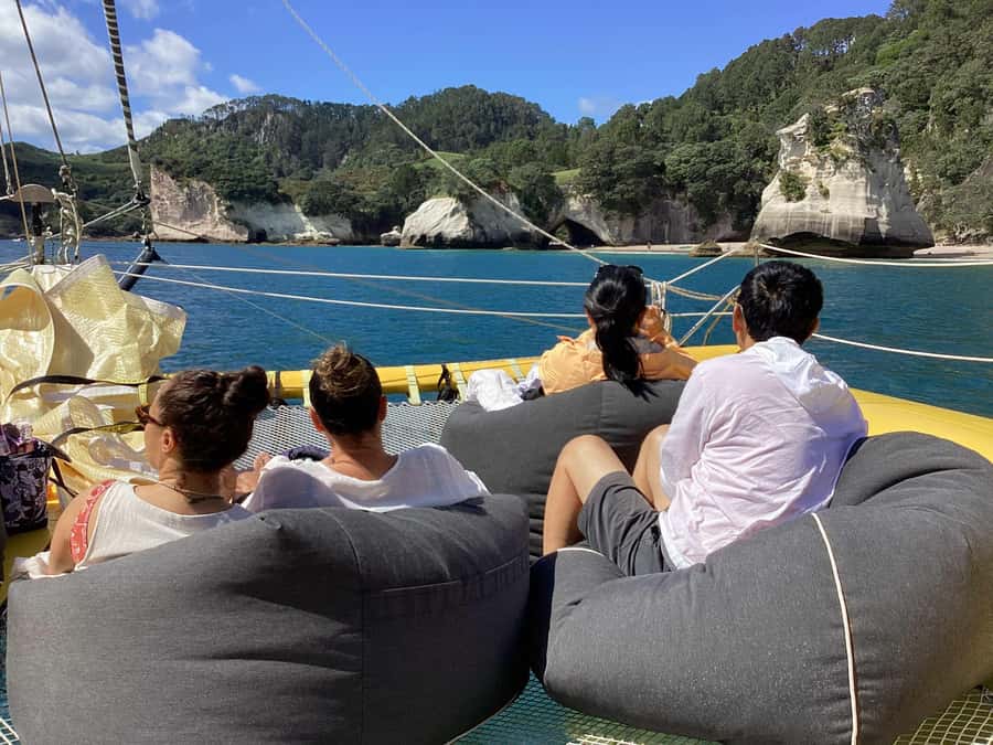 Whitianga: Sailing Trip to Cathedral Cove - Passing Cathedral Cove by catamaran